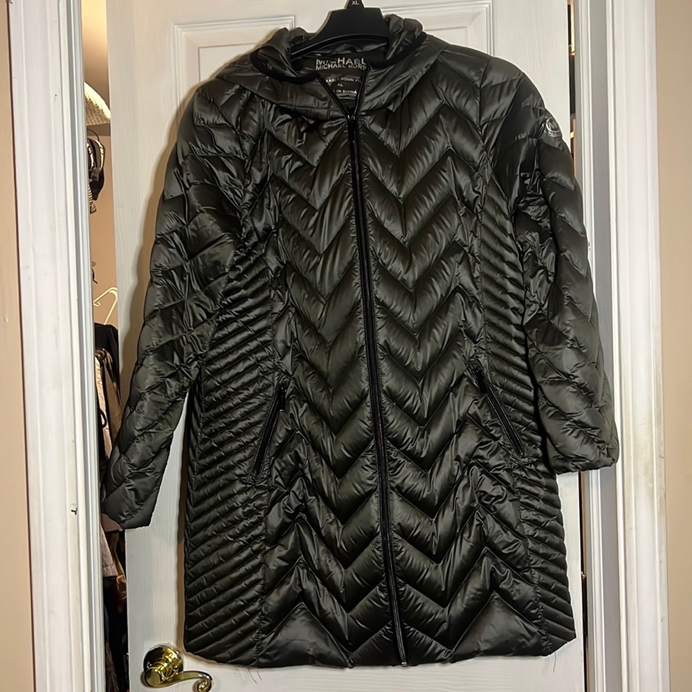 Dark green Michael Kors women’s packable puffer coat.